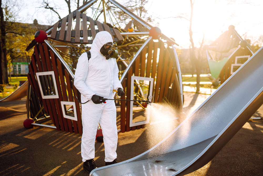 man-wearing-protective-suit-disinfecting-the-playg-2025-03-08-04-44-09-utc (1)